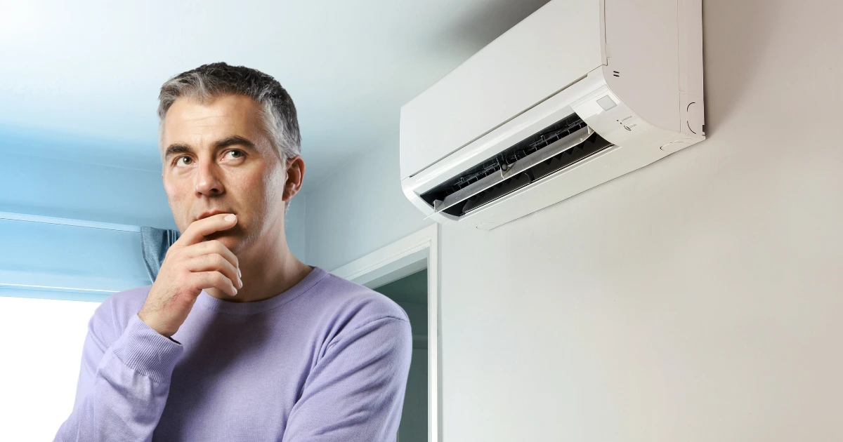 Man wondering about what size air conditioner is best for his home.