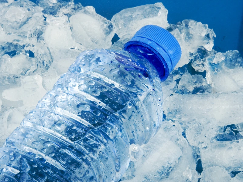 frozen plastic water bottle in freezer.